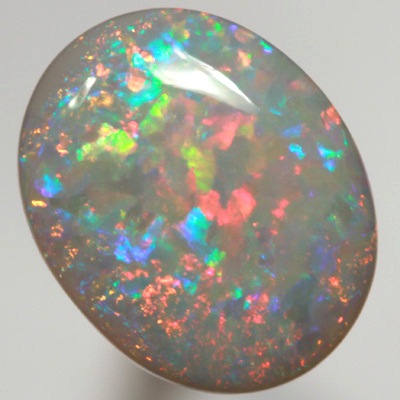 SOLID SEMI BLACK OPAL Top quality. Floral Harlequin pattern, Bright reds contrasted with turquoise greens SEE VIDEO  